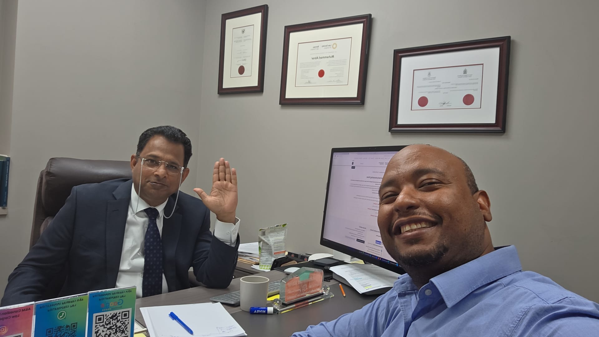 Dr. Muhammad Abrar with Dr. Ahmed at the A&M Canadian Immigration office in Winnipeg